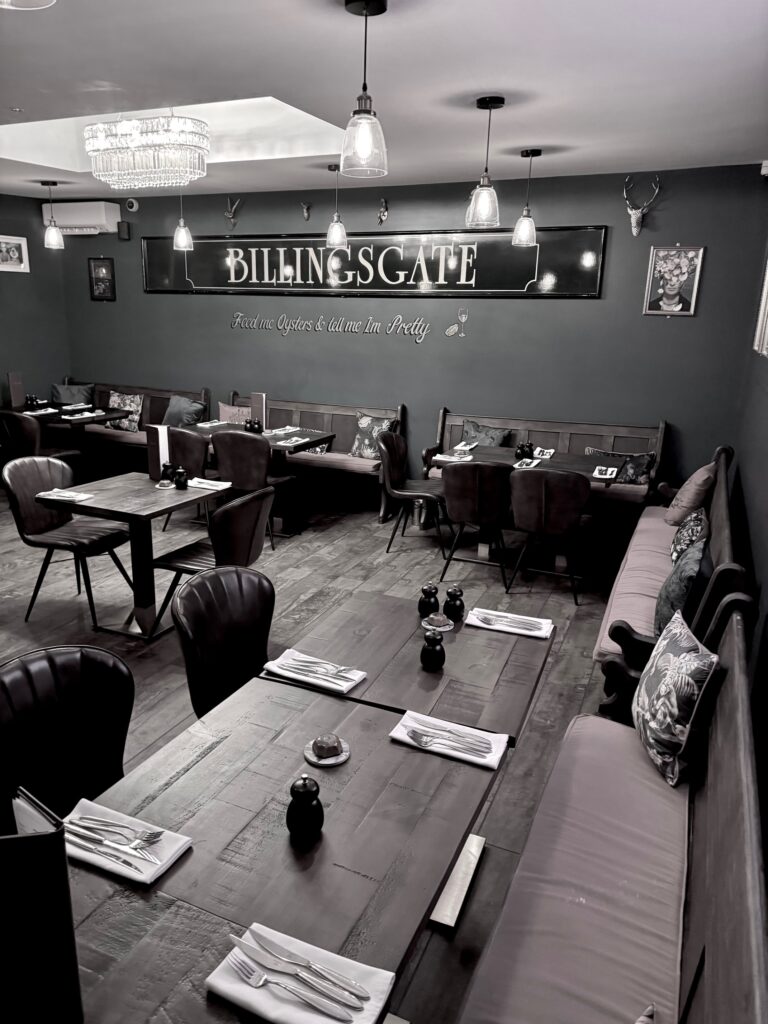 Wide interior image of Essex Oyster Company restaurant