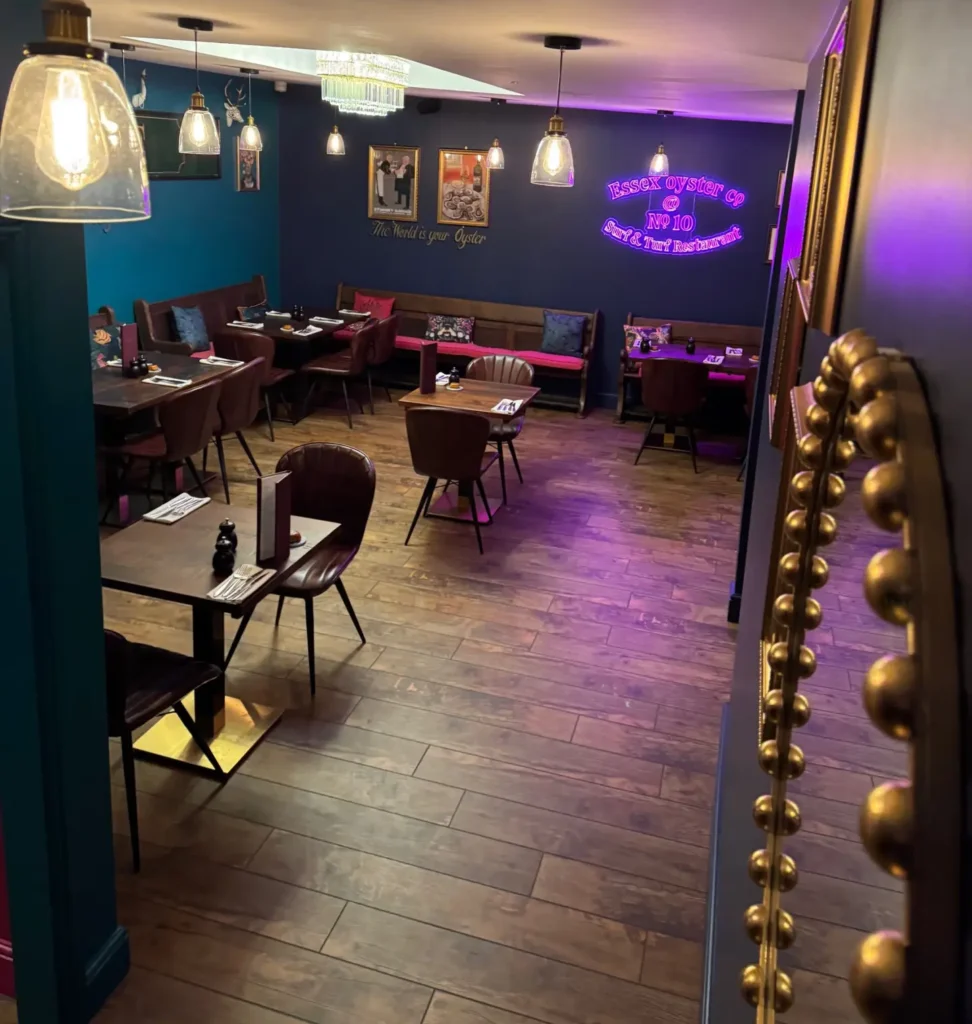 Colourful and moodily lit Essex Oyster Co restaurant interior